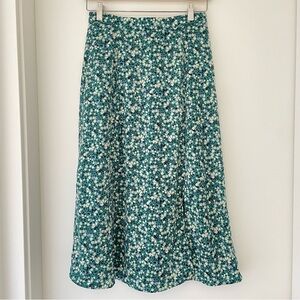 Uniqlo floral midi skirt with side front slit.